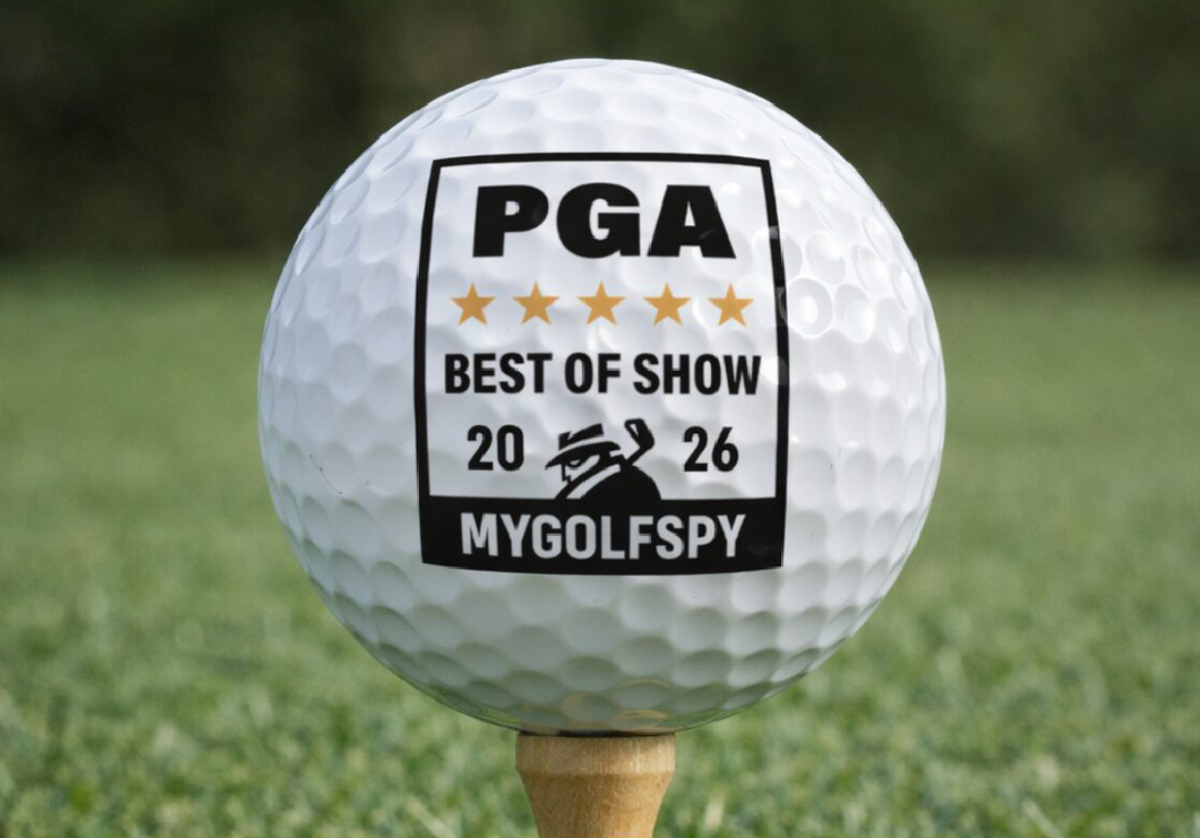 Golf ball on a tee with 'PGA Best of Show 2026' label on grass