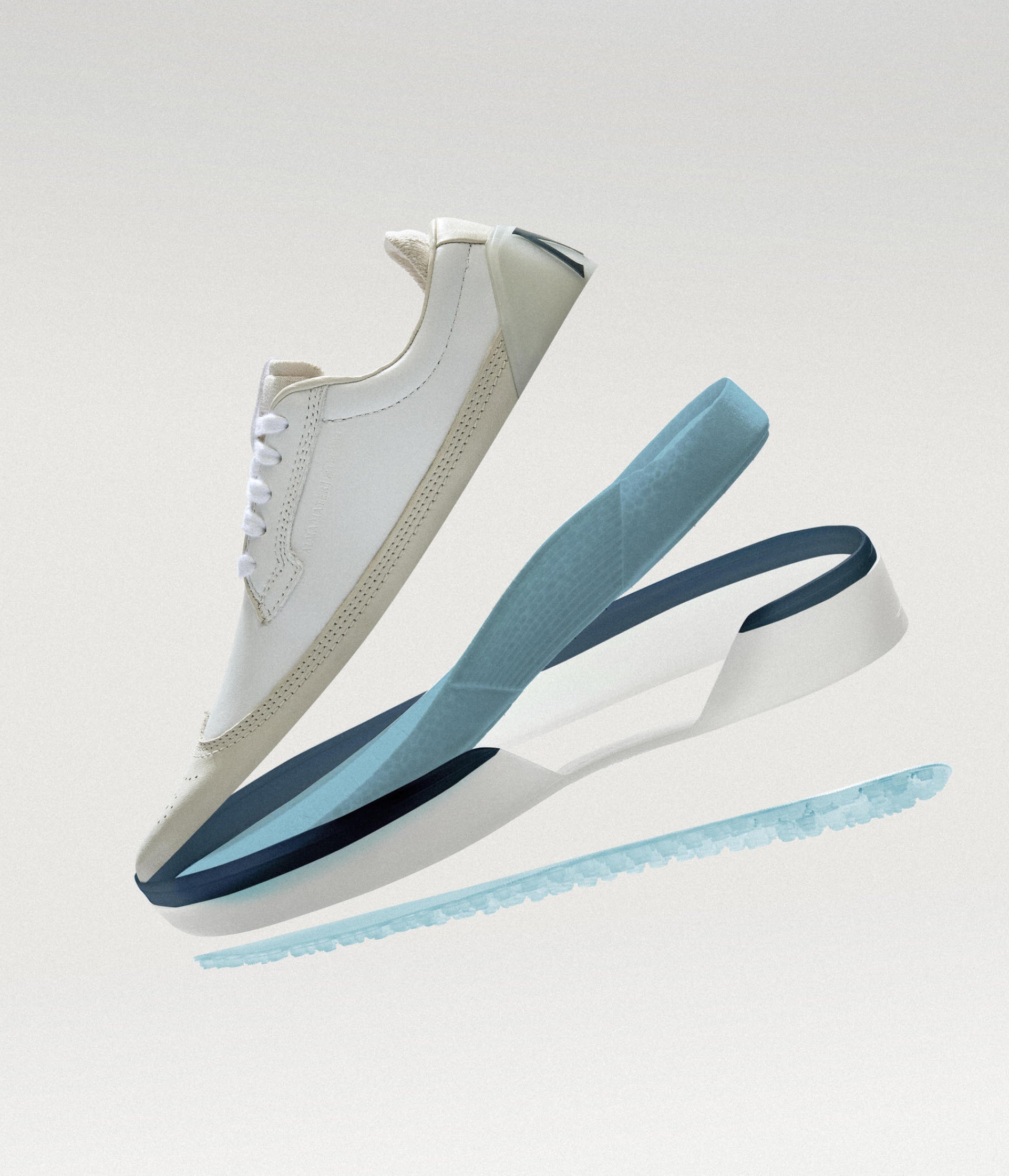 Beta Longwing White/Navy shown in an exploded view with layered sole components separated against a neutral background
