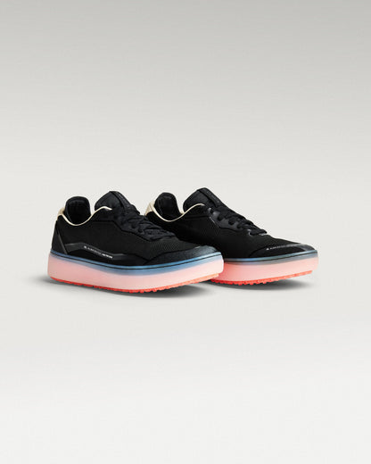 Side view of black and flare Beta Lite golf shoe