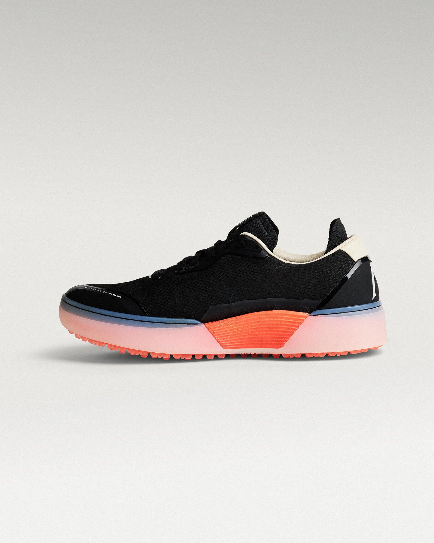 Medial profile of black and flare Beta Lite golf shoe