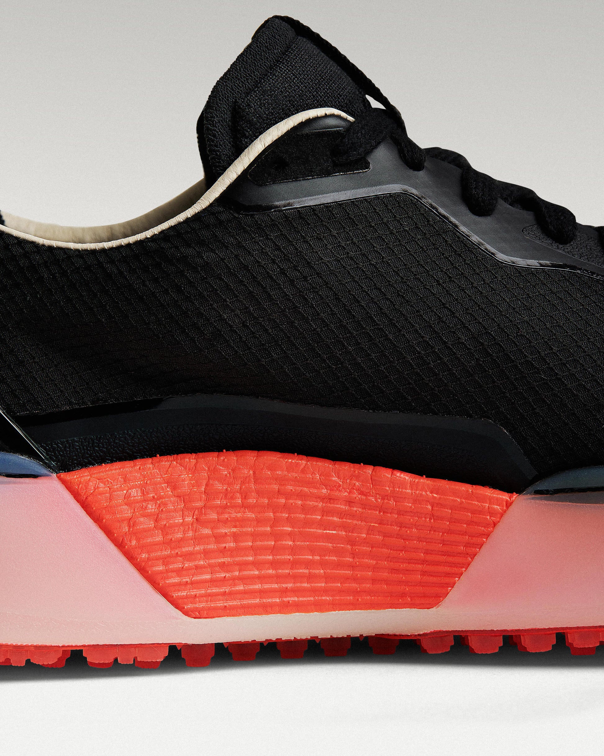 Close-up of midsole and outsole showing layered construction