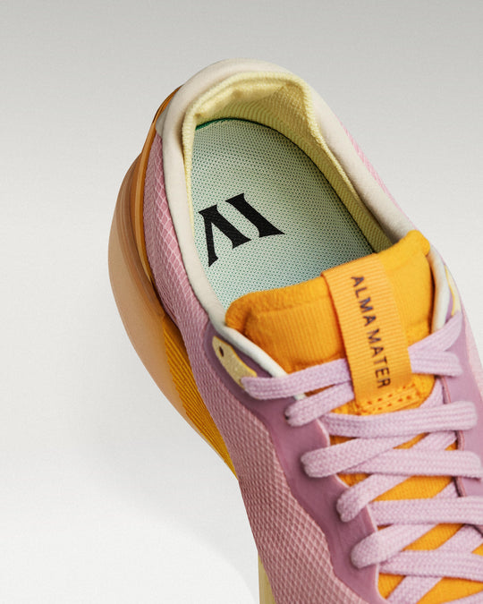 Close-up of interior lining and insole with logo, showcasing floating fit system