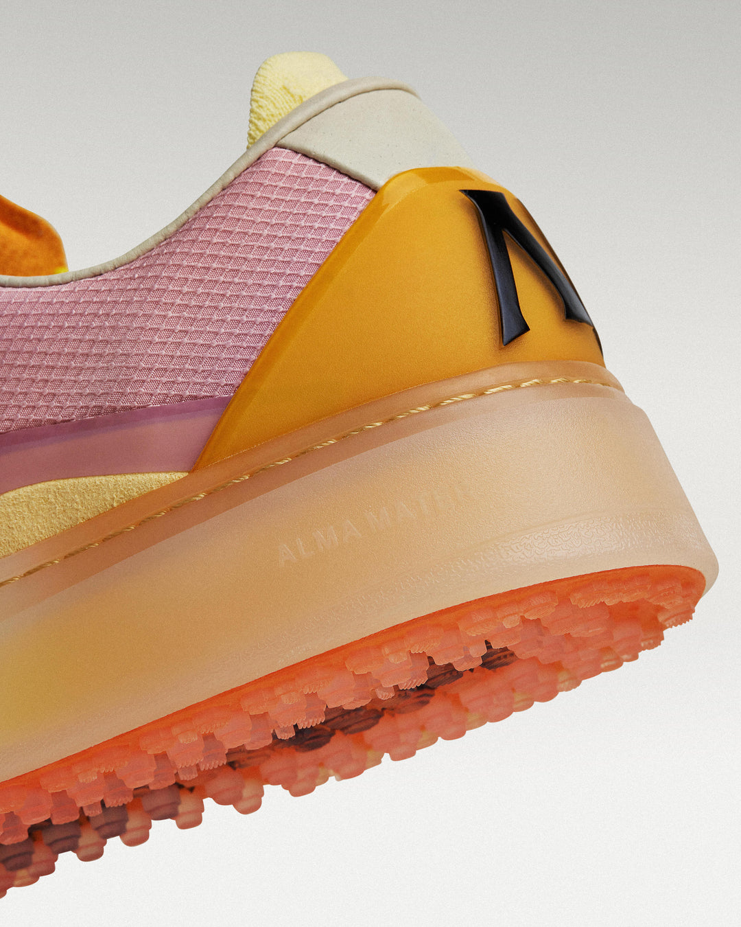 Close-up of midsole and outsole showing heel construction