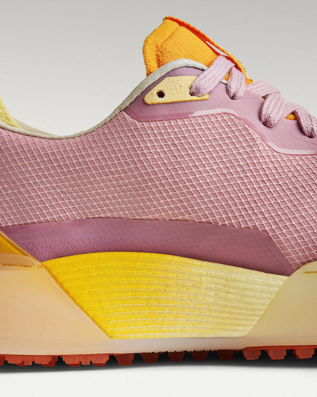 Close-up of side panel showing slipper construction, textured mesh and support structure