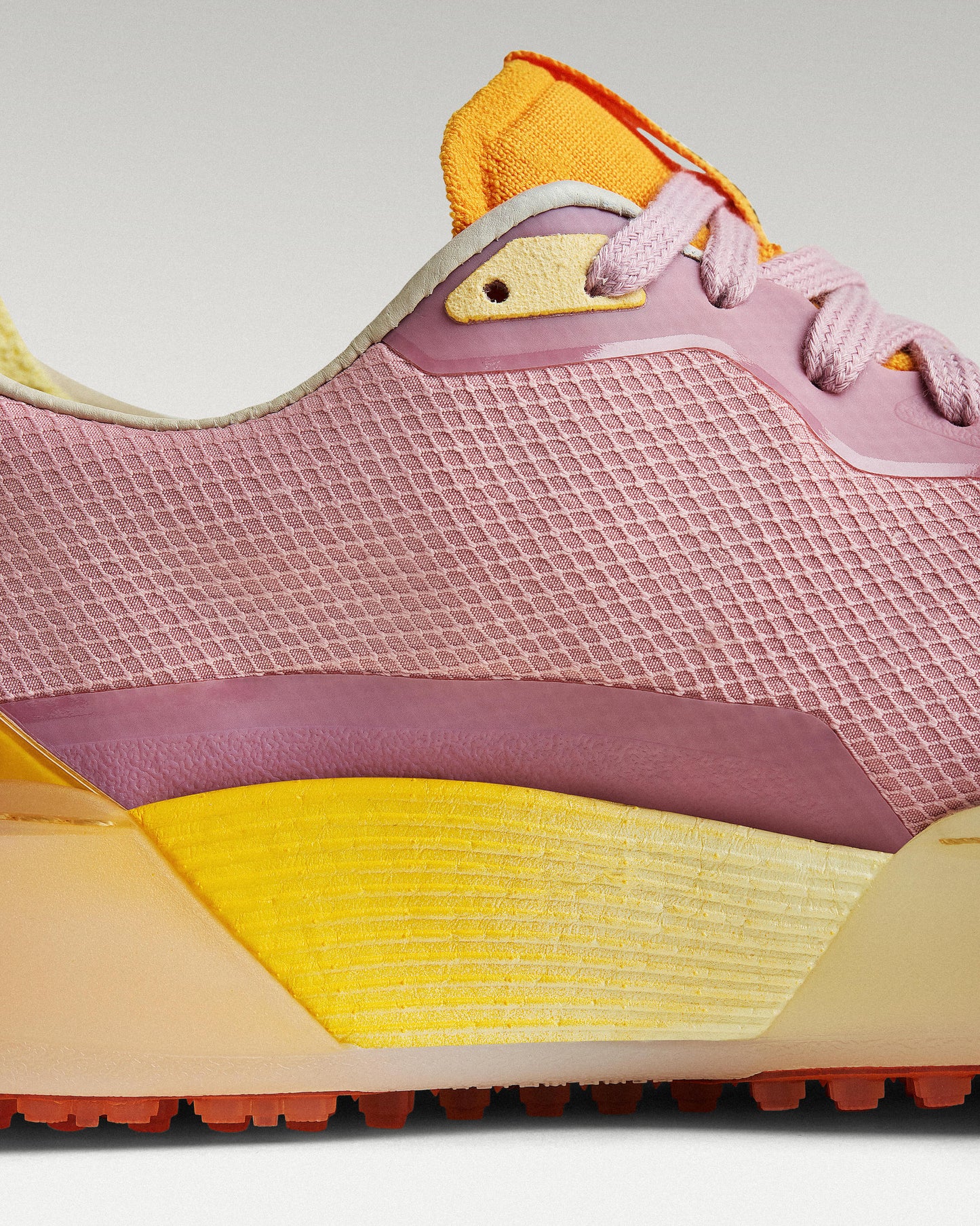 Close-up of side panel showing slipper construction, textured mesh and support structure