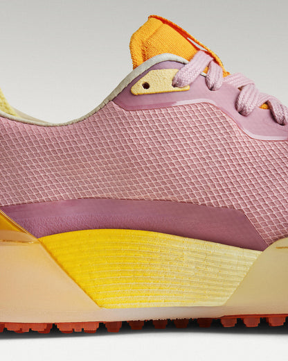Close-up of side panel showing slipper construction, textured mesh and support structure