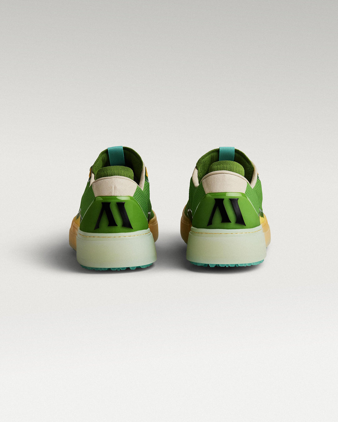Back view of Olive/Aqua eta Lite golf shoes with heel detail