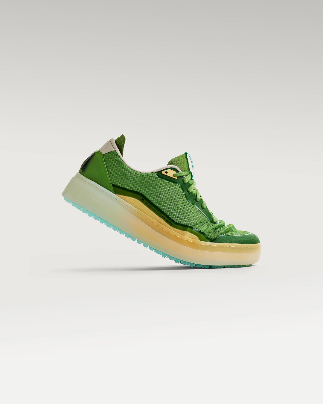 Side view of Olive/Aqua Beta Lite golf shoe, showcasing flex