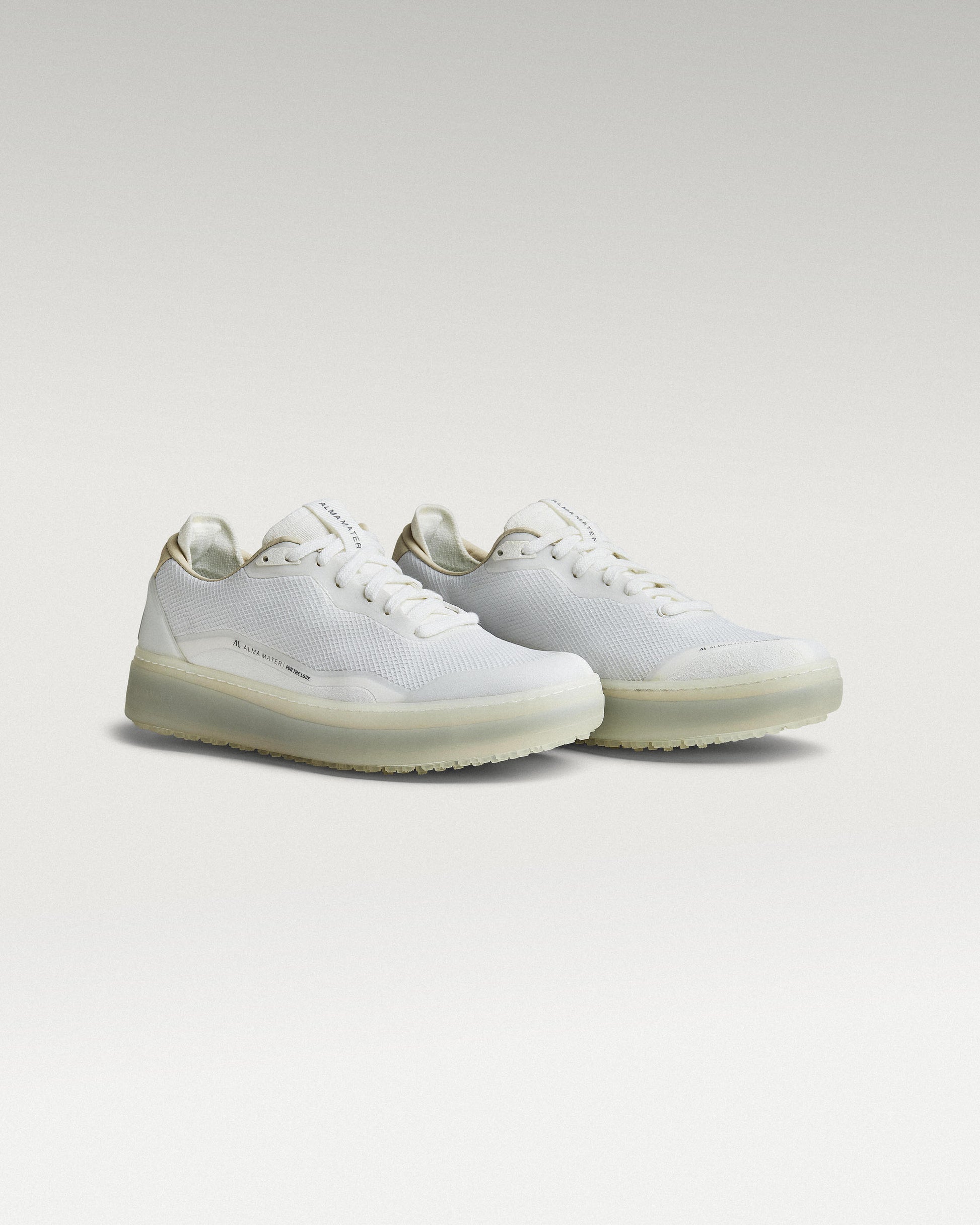 45 Degree Angled view of white and grey Beta Lite golf shoe