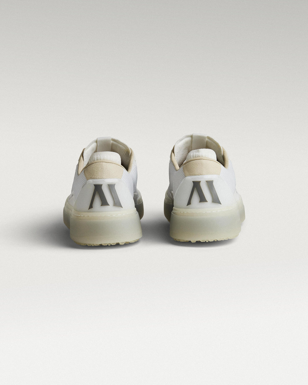 Back view of white and grey Beta Lite golf shoes with heel detail