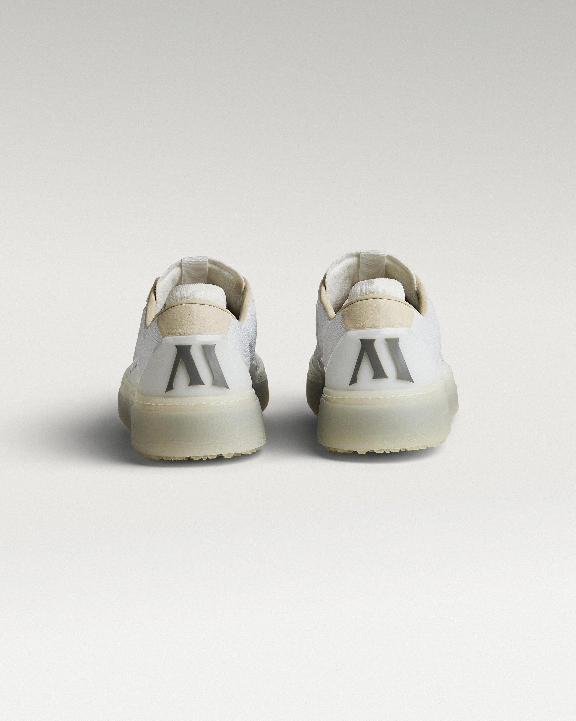 Back view of white and grey Beta Lite golf shoes with heel detail