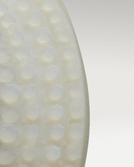 Outsole view of white and grey Beta Lite golf shoe showing traction pattern