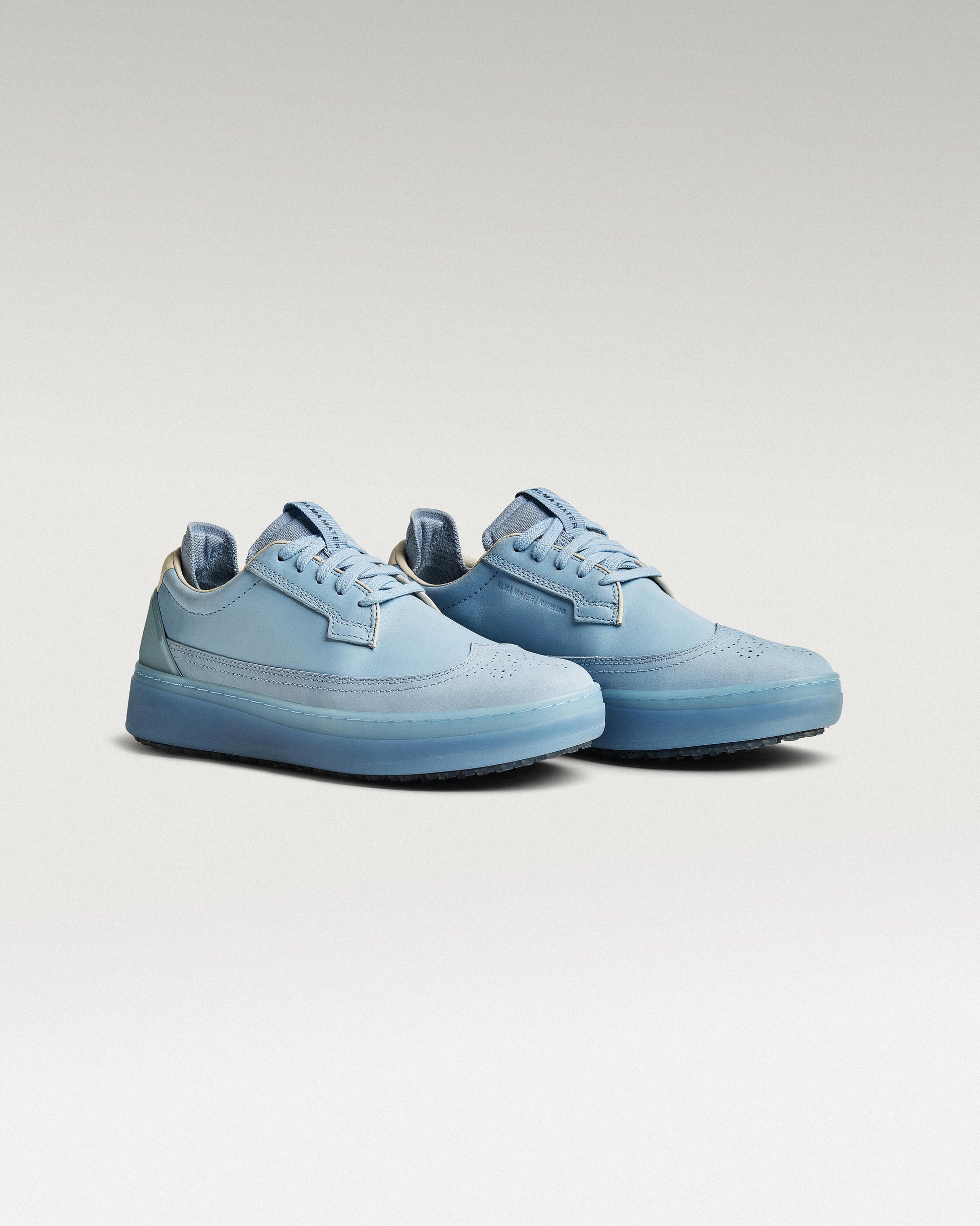 45 degree angled view of Sky/Navy Beta Longwing golf shoe
