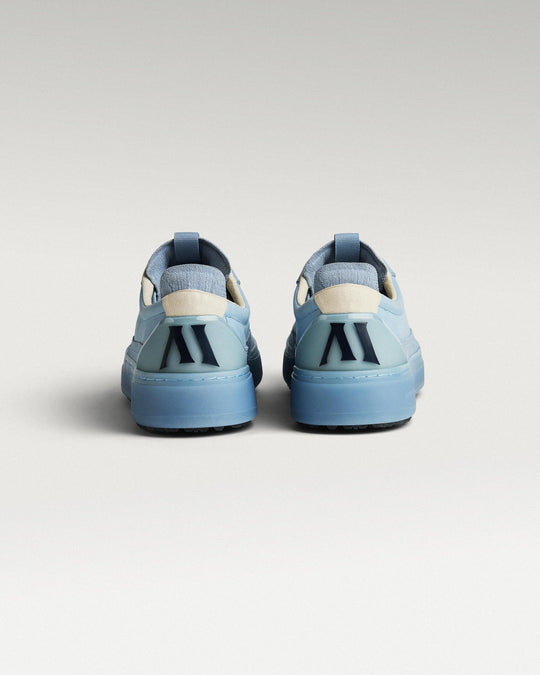 Back view of Sky/Navy Beta Longwing golf shoes with heel detail