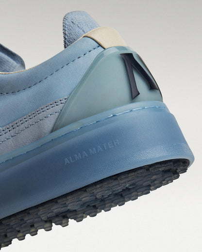 Close-up of midsole and outsole showing heel construction