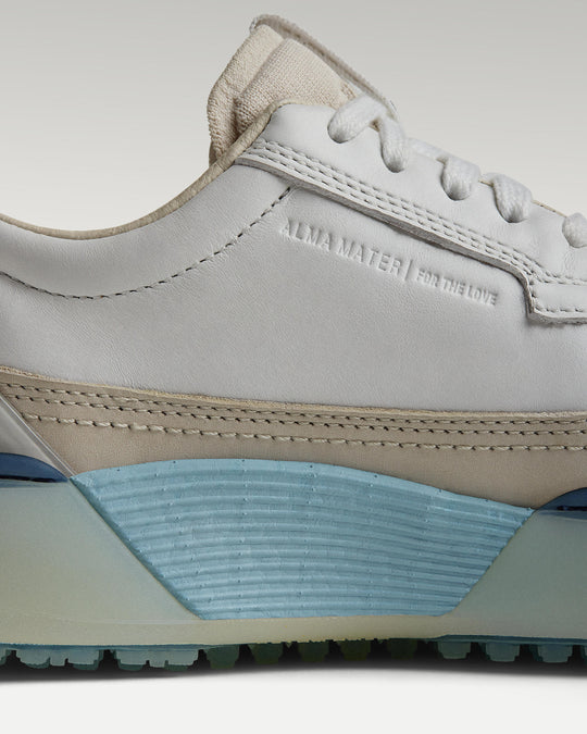 Close-up of side panel showing slipper construction, leather and support structure