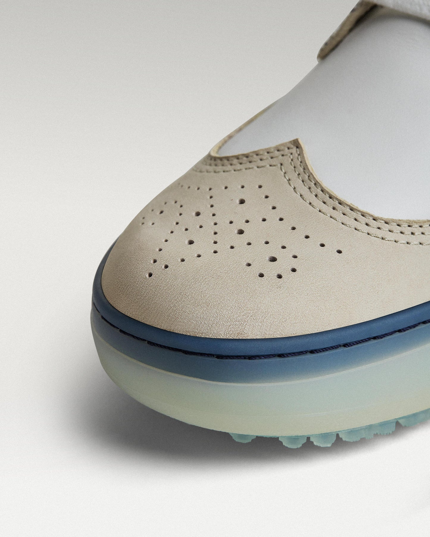 Close-up of leather upper and toe box detail on Beta Longwing golf shoe