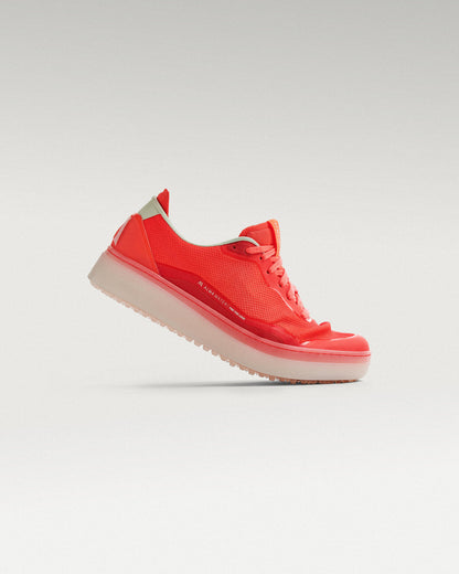 Side view of Flare / Old Rose Beta Lite golf shoe, showcasing flex