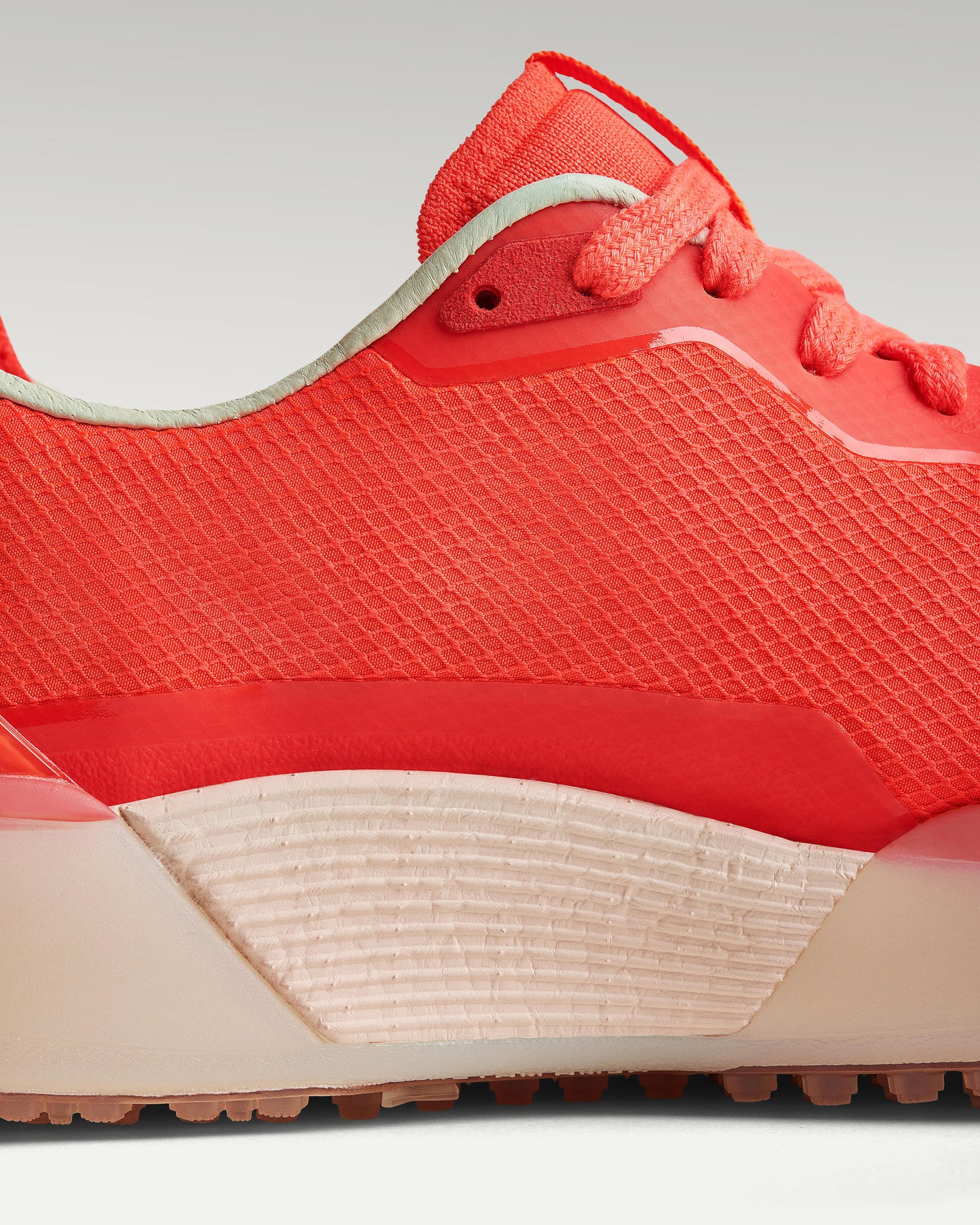 Close-up of side panel showing slipper construction, textured mesh and support structure