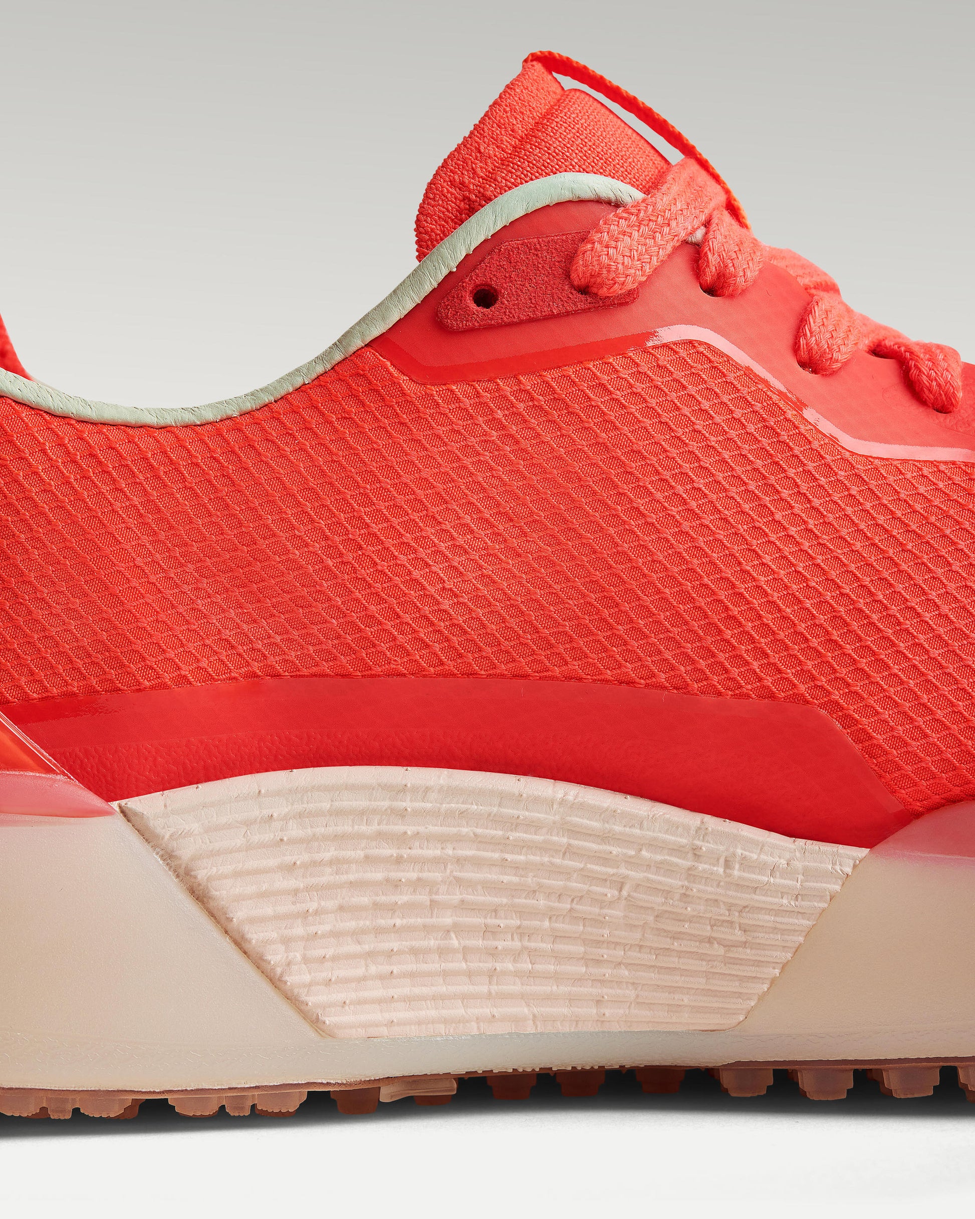 Close-up of side panel showing slipper construction, textured mesh and support structure