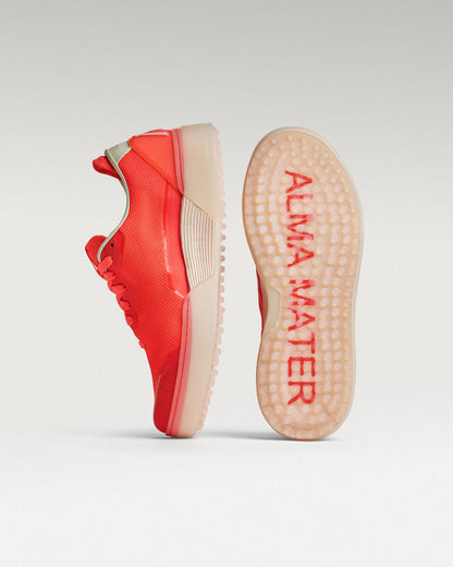 Flare/ Old Rose Beta Lite golf shoe with outsole facing forward, showing traction pattern and logo