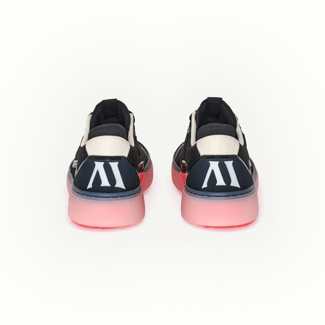 Rear studio view of the Men’s Beta Lite in black and flare,