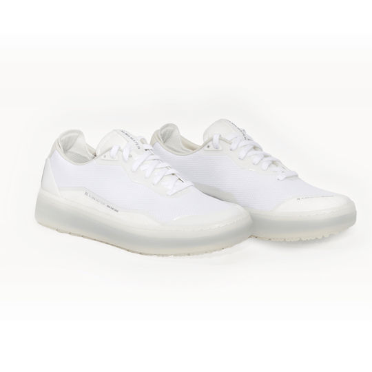 Studio image of the Men’s Beta Lite in White and Gray, featuring a lightweight white mesh upper and translucent gray outsole, shown as a pair in an angled front view.