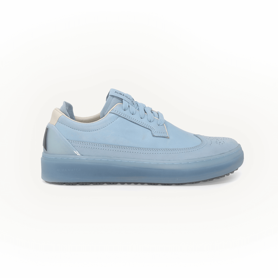 Light blue Beta Longwing golf shoes on a white background