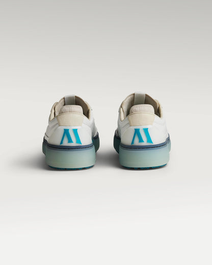 Back view of white and aqua Beta Derby golf shoes with heel detail