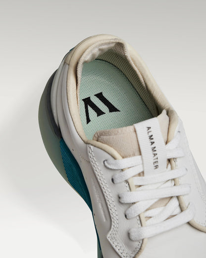Close-up of interior lining and insole with logo, showcasing floating fit system
