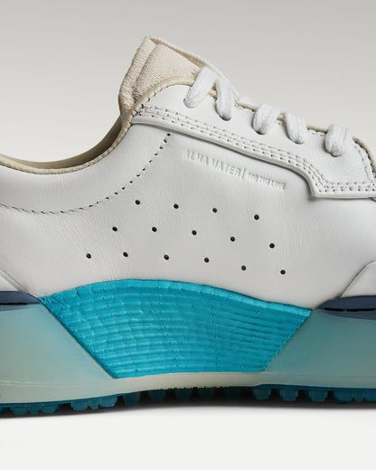 Close-up of side panel showing slipper construction, leather and support structure