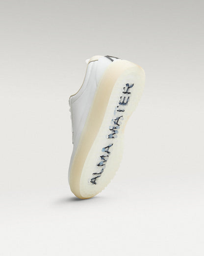 Bottom view of white and white Beta Derby golf shoe showing traction pattern