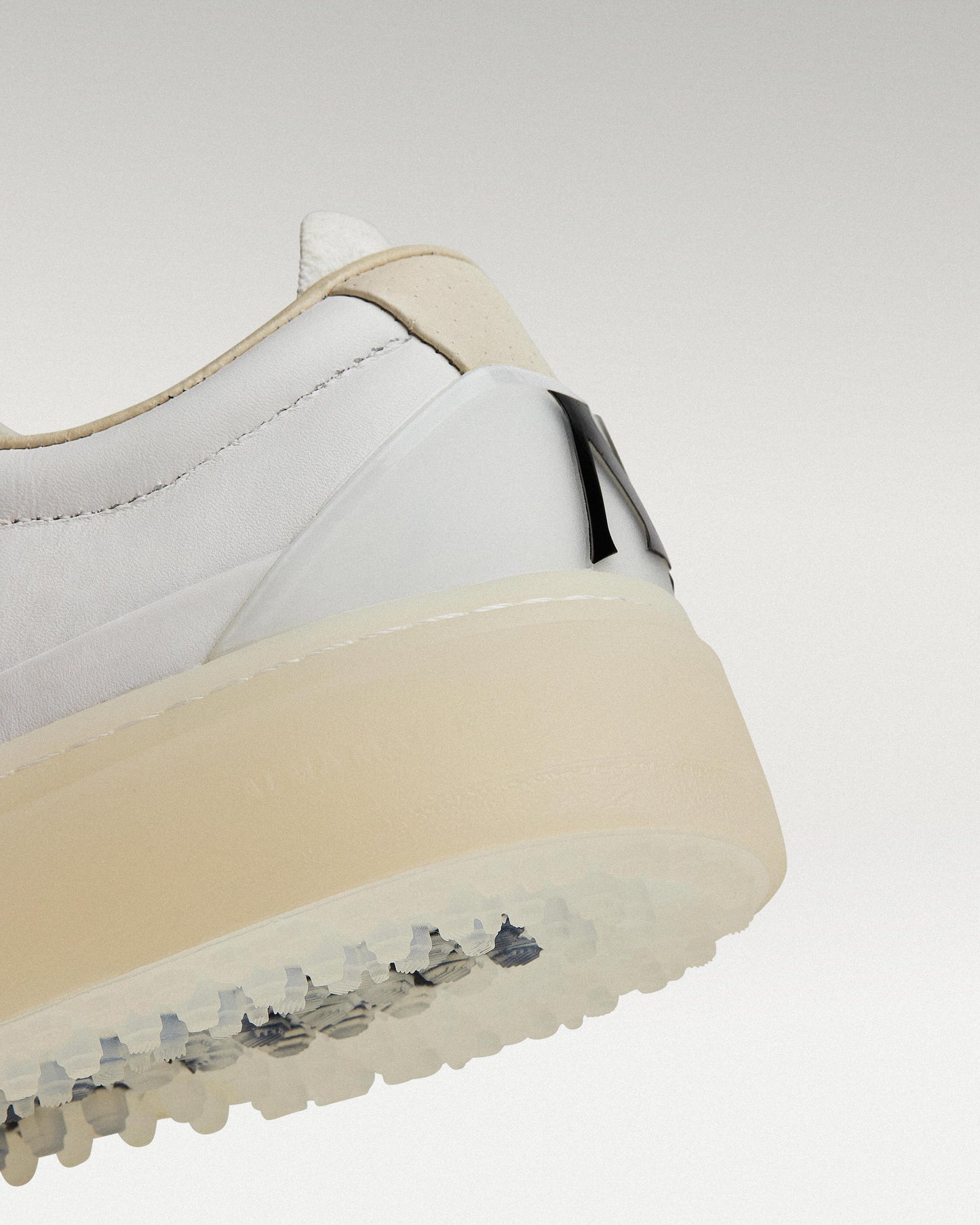 Close-up of midsole and outsole showing heel construction