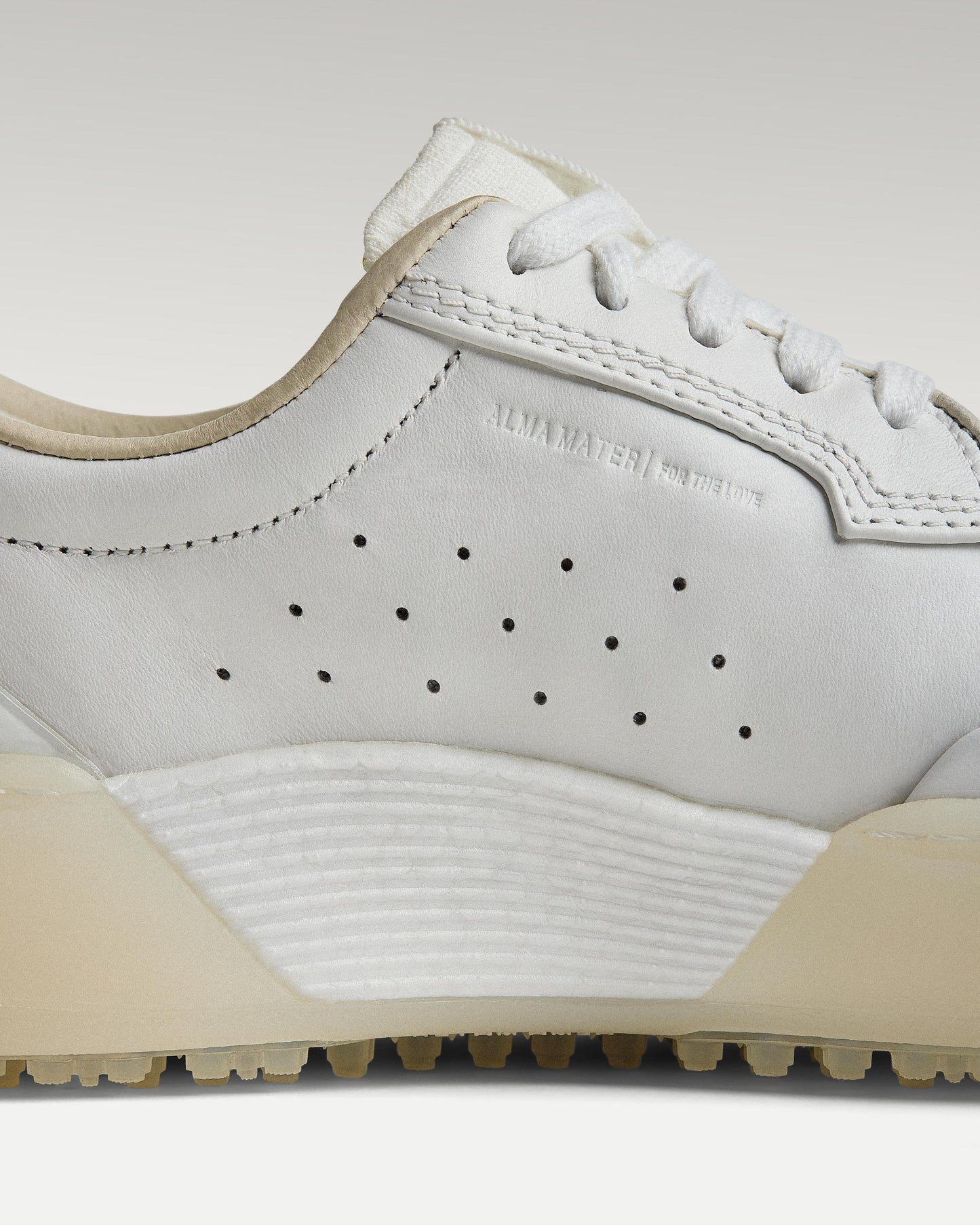 Close-up of side panel showing slipper construction, leather and support structure
