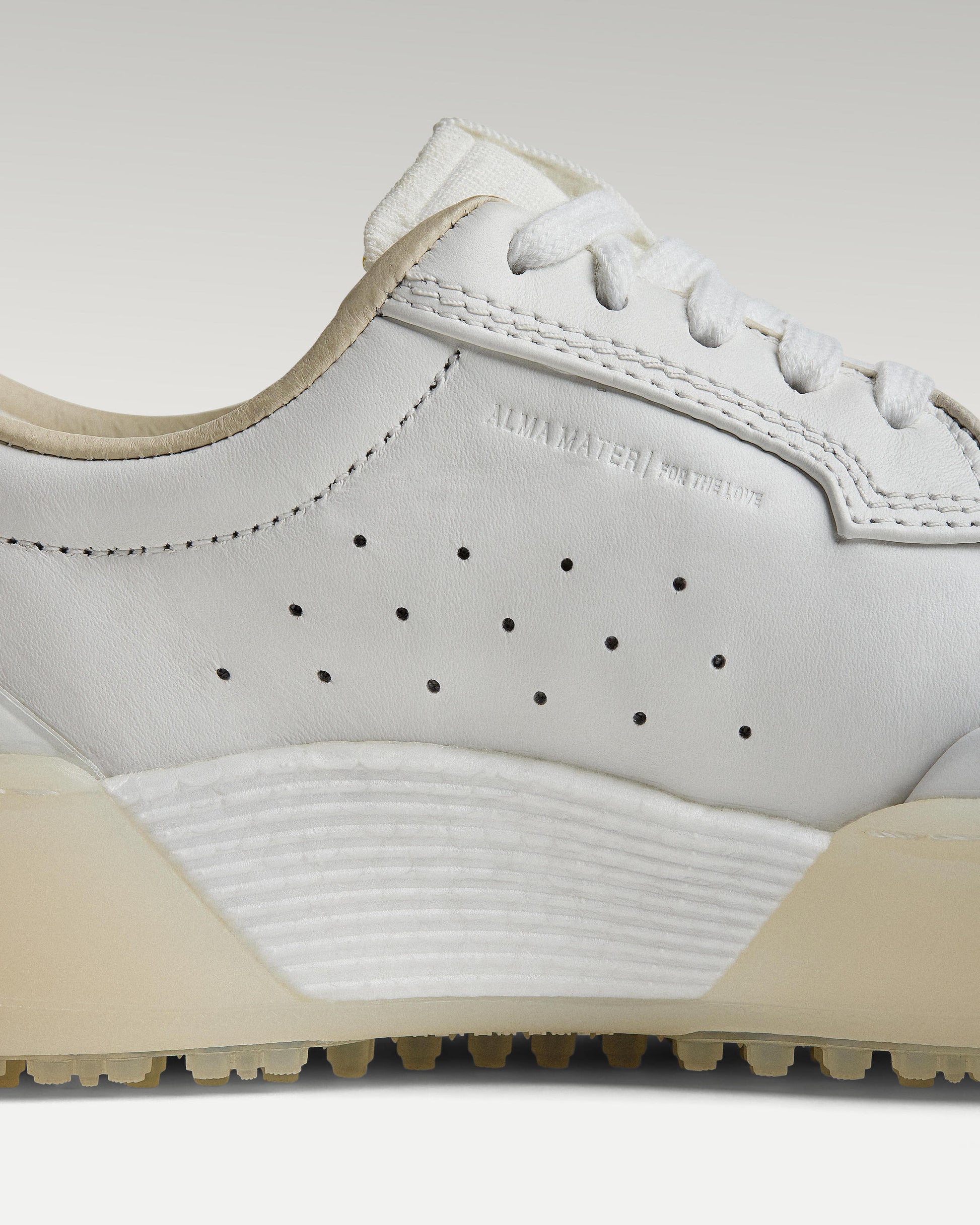 Close-up of side panel showing slipper construction, leather and support structure
