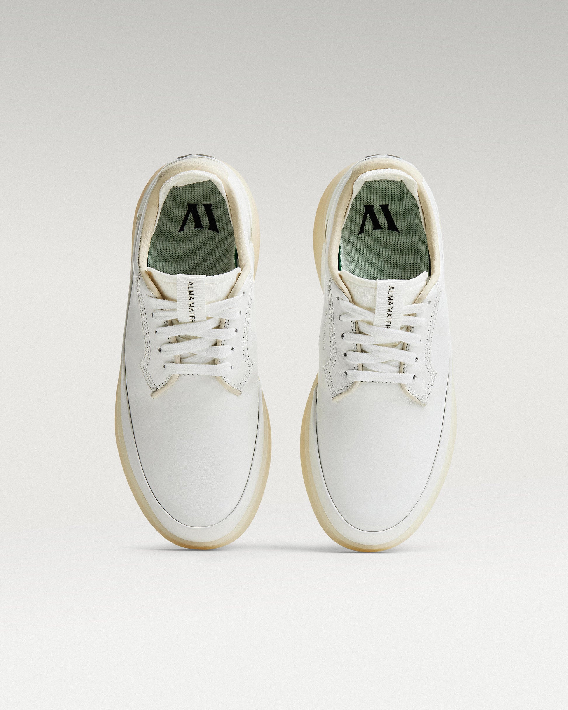 Top view of white and white Beta Derby golf shoes
